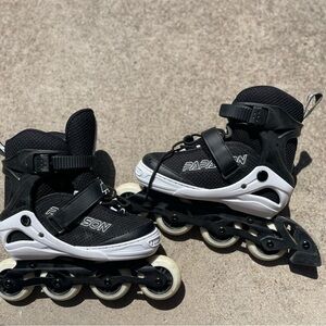 Black and White Inline Skates with High-Top Design and Adjustable Straps